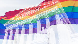 Image of LGBTQ+ flags double exposed over the Supreme Court of the United States